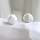 White studs sterling silver earrings, faceted pebbles round