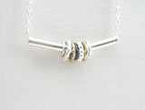 Sterling Silver Necklace with Silver and 14 k Gold Spinners